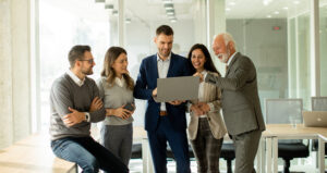businesspeople working as a team in an office setting